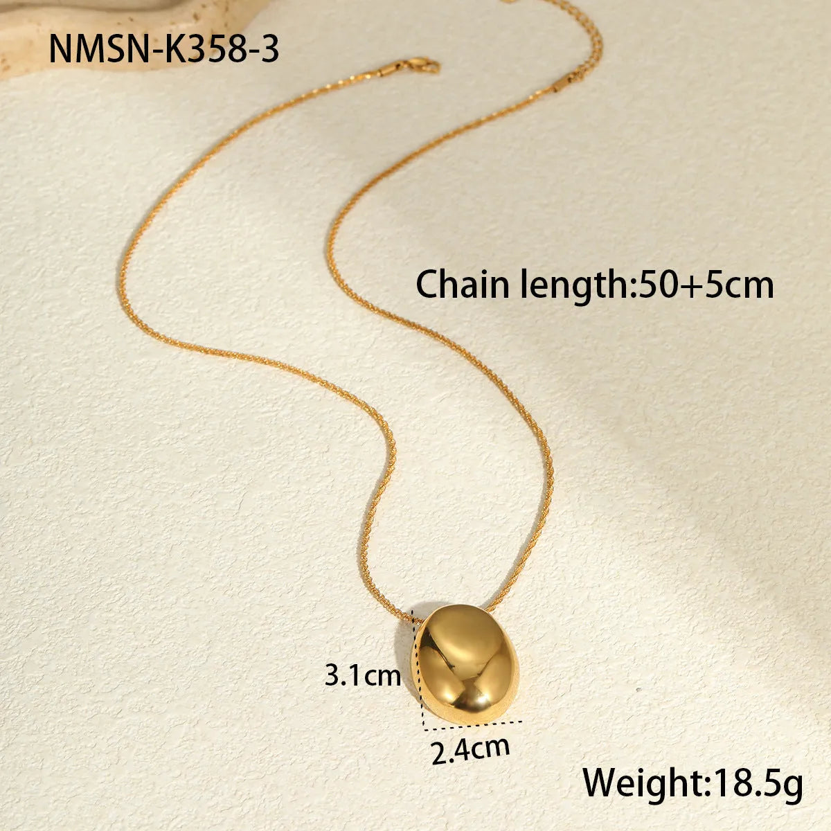 Gold geometric pendant necklace on a stainless steel chain with adjustable length.