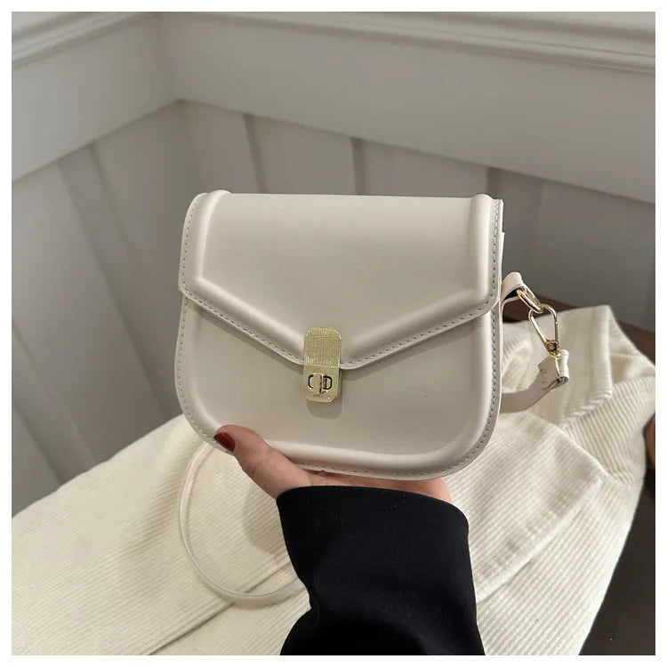Soft PU leather clamshell messenger bag in horizontal square shape, shown in khaki colour.