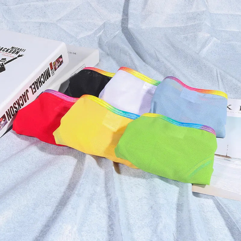 Women's solid colour mesh briefs in quick-drying nylon fabric, shown in multiple colour options.