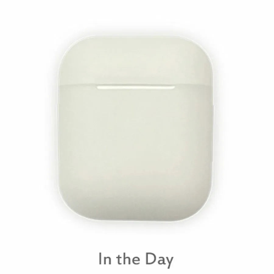 Glow-in-the-dark silicone flip-top protective case for Apple AirPods in a solid luminous colour.