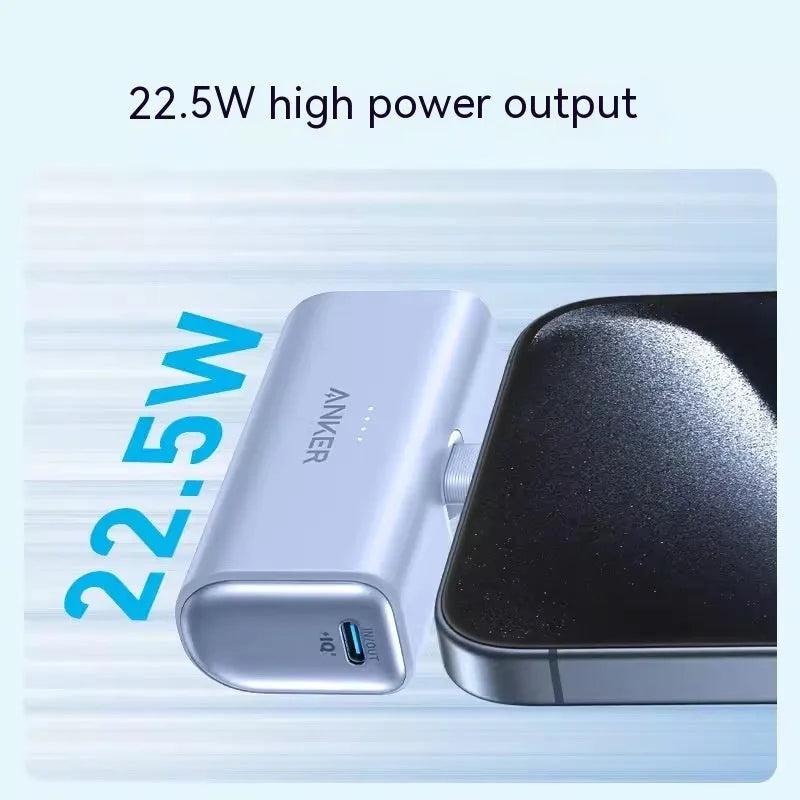 Small capsule-shaped power bank in multiple colours showing USB-C port and compact size.
