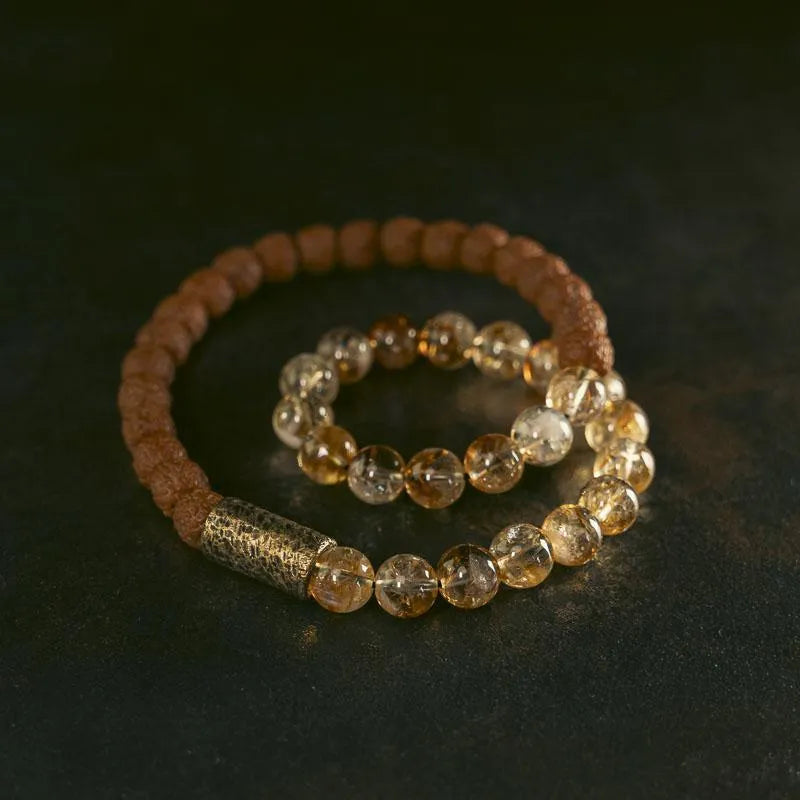 Personalised natural colour LCD double circle bracelet showing custom message on citrine display