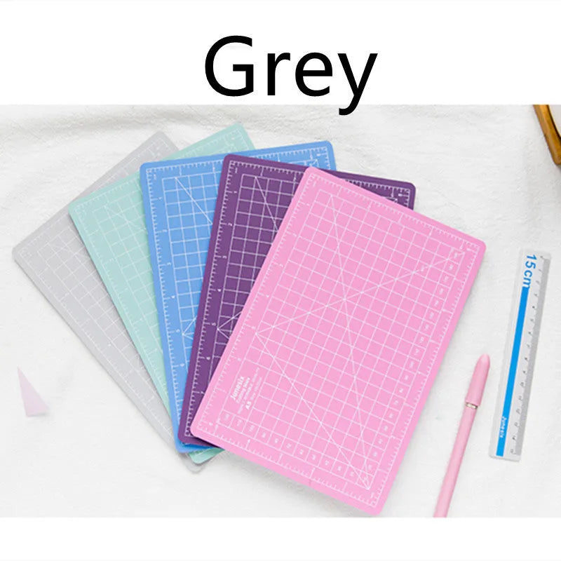 Art pen knife cutting board set with backing board, ruler, sharpener, and blade in choice of colours