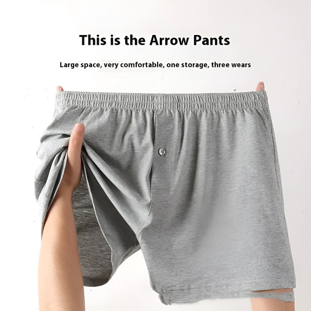 Men's solid colour cotton boxer shorts on a hanger, showing loose fit and high waist.