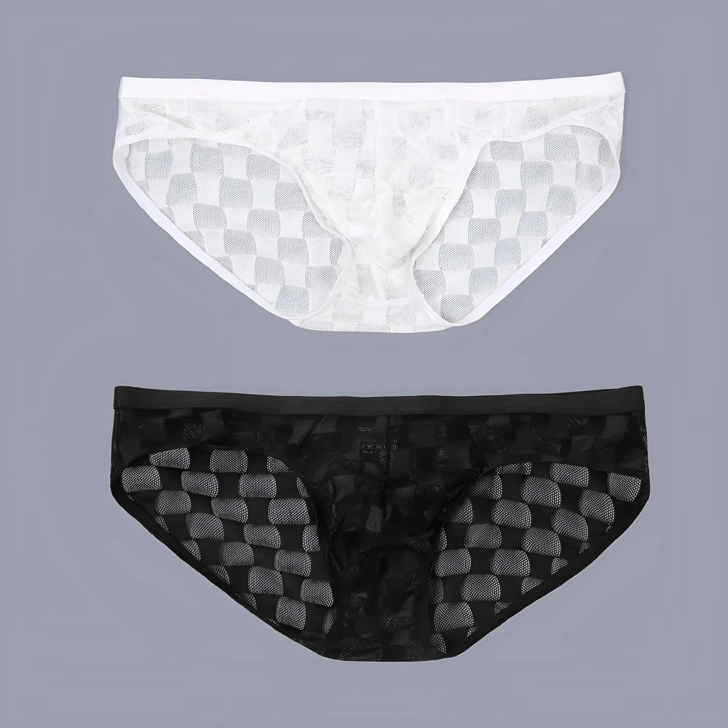 Men's black and white plaid mesh underpants with U-convex design on mannequin