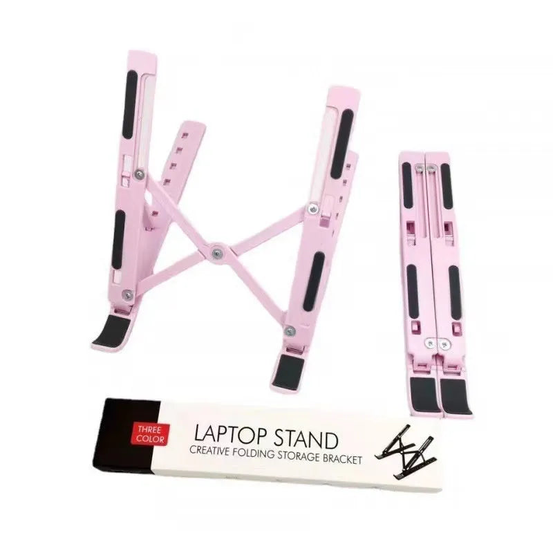 Silver aluminium alloy folding laptop stand holding a laptop, shown alongside its black cloth storage bag.