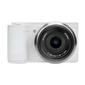 Compact digital camera in black with ultra-wide-angle lens, touch screen, and sling on a white background