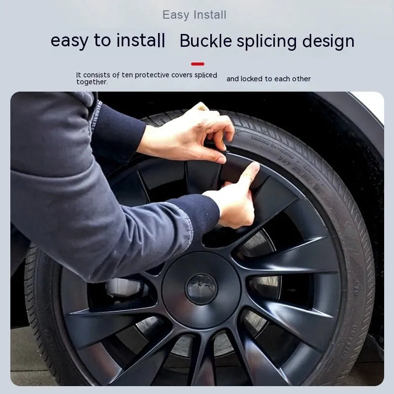 Set of four plastic wheel hub covers for a Tesla Model Y, showing colour options.