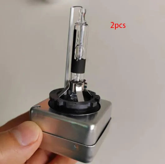 Xenon automotive headlight bulb with aluminium alloy shell and quartz tube, showing D1S and D1R base types.