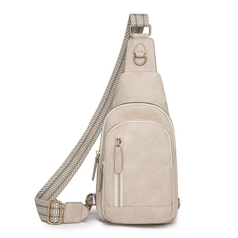 Soft brown women's crossbody chest bag with open pocket and sewing thread detail