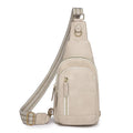 Soft brown women's crossbody chest bag with open pocket and sewing thread detail