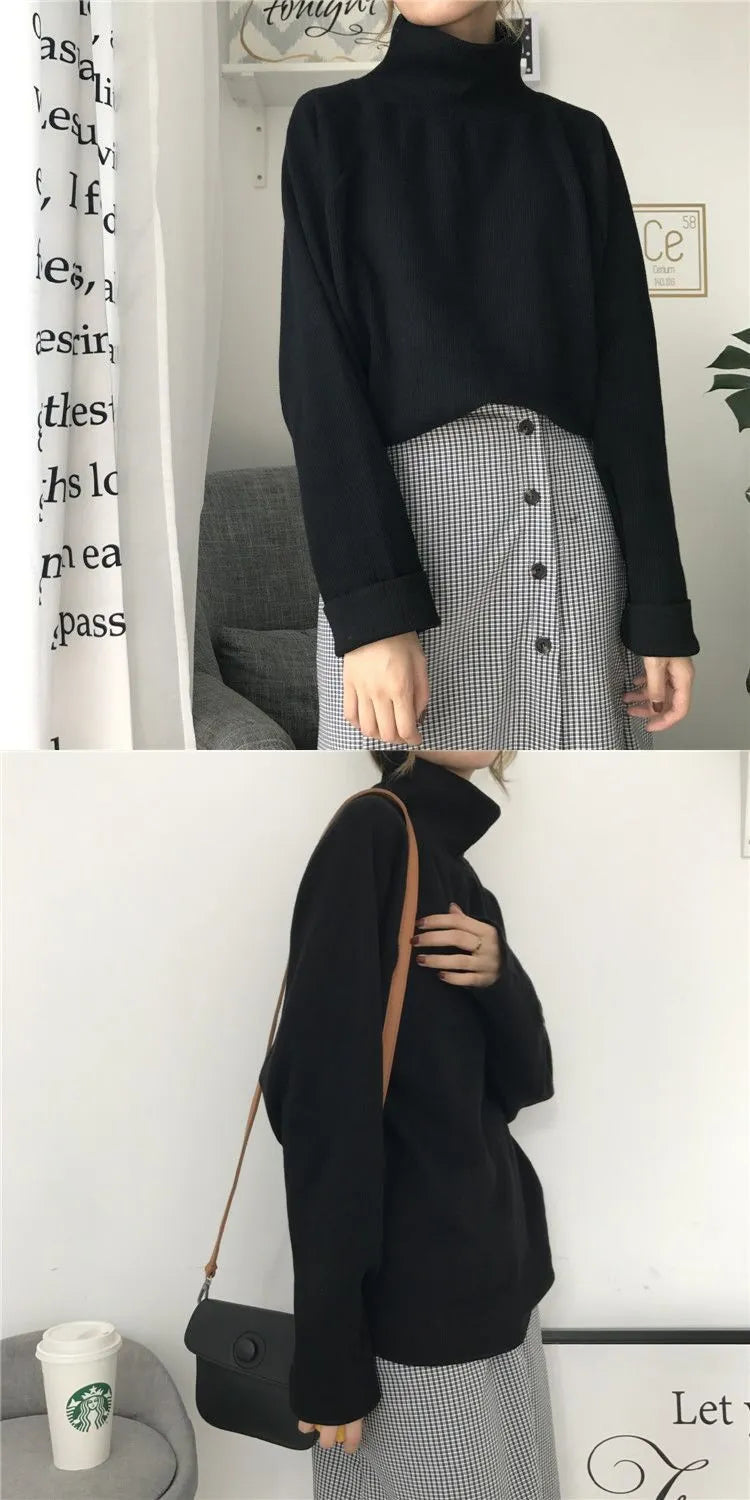 Women's apricot coloured half-high collar long sleeve loose fit top on a hanger