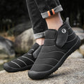 Men's waterproof cotton snow boots in black, shown with a non-slip rubber sole.