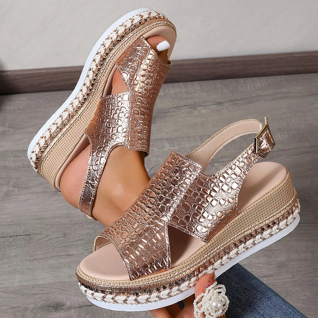 Gold women's Roman shoes with round toe, hollow-out design, and adjustable ankle buckle