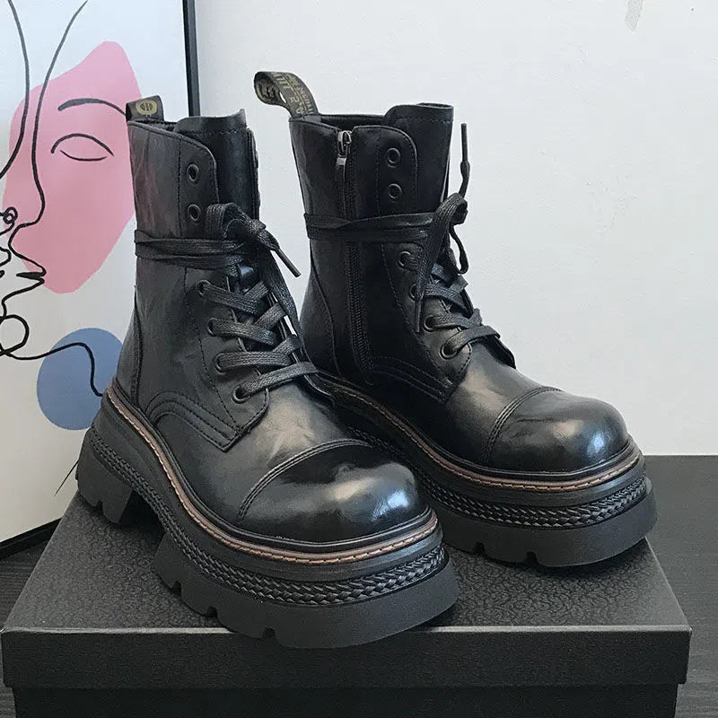 Women's black or brown ankle boots with 3-5 cm chunky mid heel, side zipper, waterproof platform, round toe, and rubber sole.