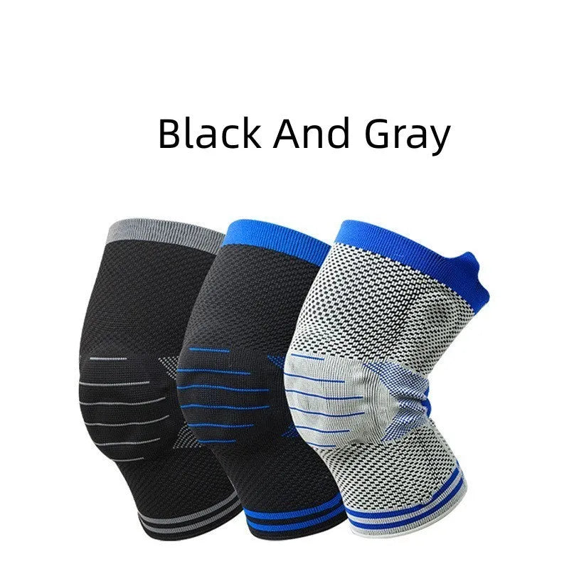 Cotton knee protector with silicone massage spring bar shock absorber in black and grey colour.