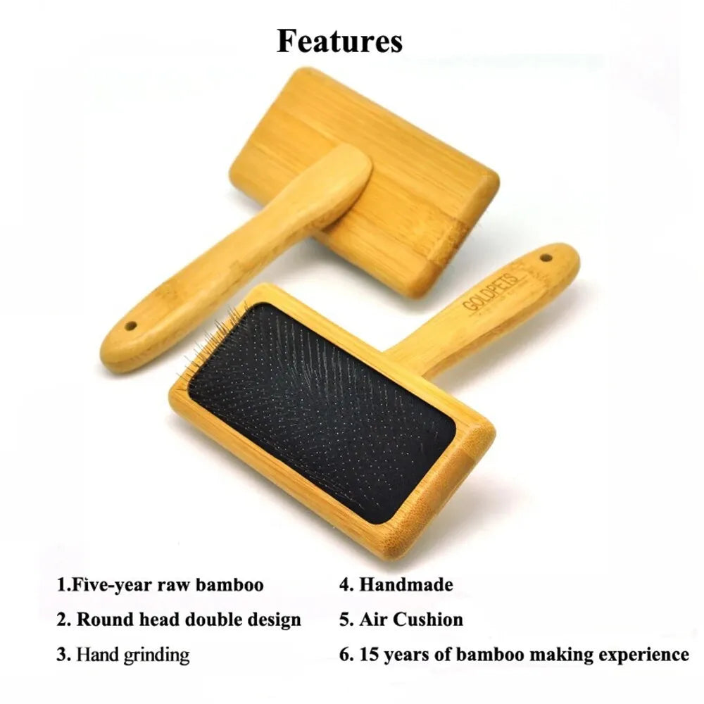 Goldpets bamboo and wood slicker brush for pets with stainless steel pins on a wooden handle.