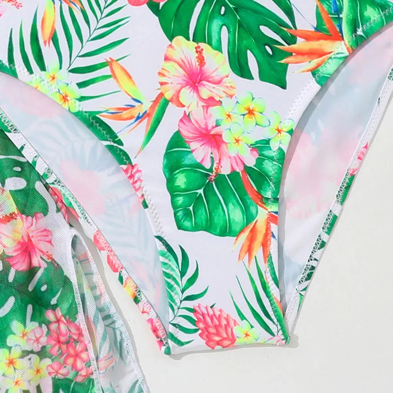 Girls' floral two-piece polyester swimsuit briefs on a white background.