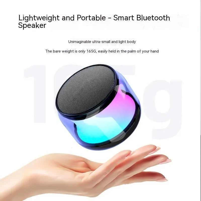 Black coloured glaze gun-shaped Bluetooth speaker with card slot on desktop