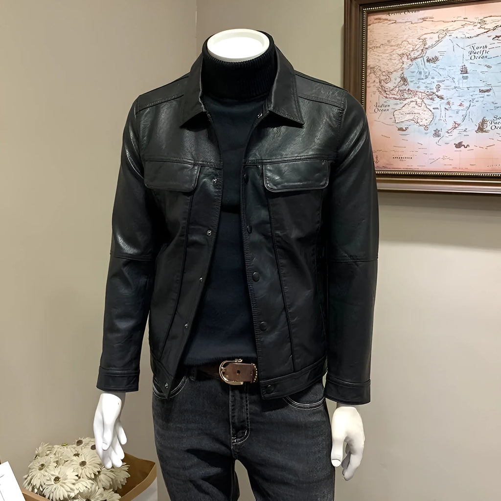 Front view of a black men's artificial leather biker jacket with loose fit, medium length, on a neutral background