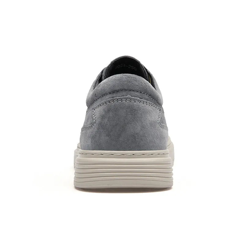 Men's grey and sand casual leather skate shoes with a round toe and rubber sole.