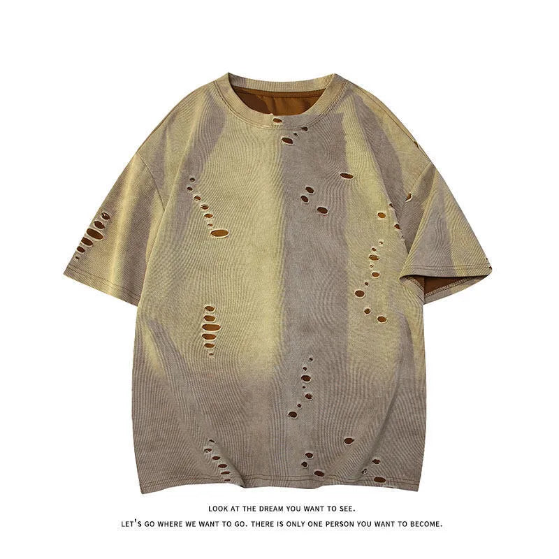 Men's blue loose fit cotton blend T-shirt with ripped detail on short sleeve, laid flat.