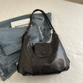 Women's leather shoulder bag in horizontal square shape with single strap
