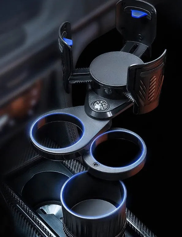 Black ABS car water cup holder with a retractable adjustable base on a car centre console.