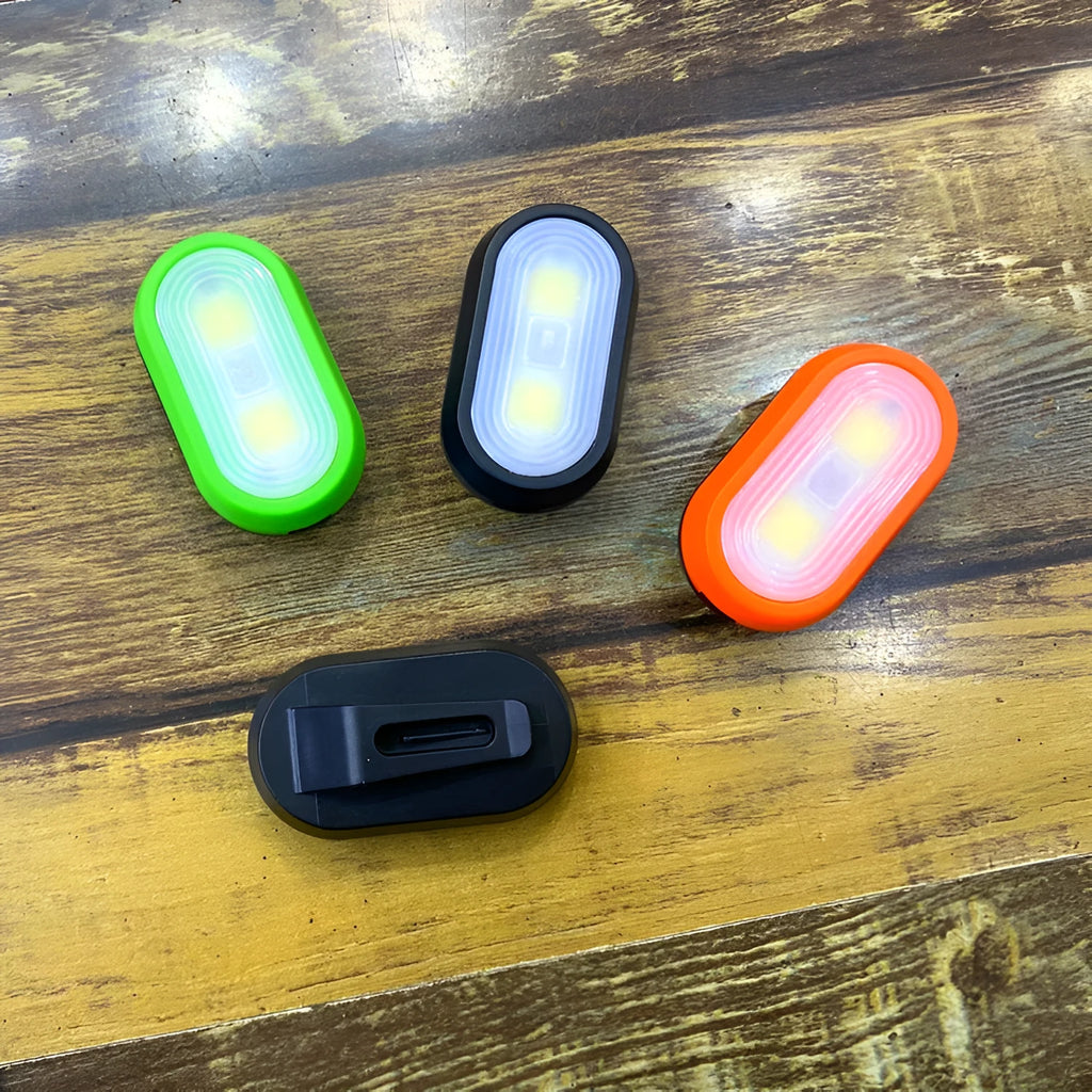 Compact keychain light with 3W LED in black, blue, green, and orange ABS casing