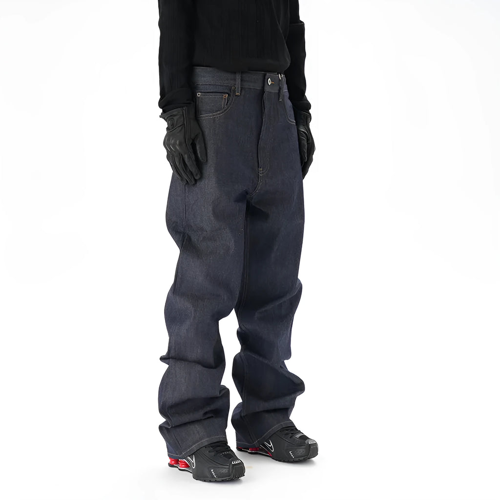 Dark blue loose straight-leg casual jeans on a neutral background.