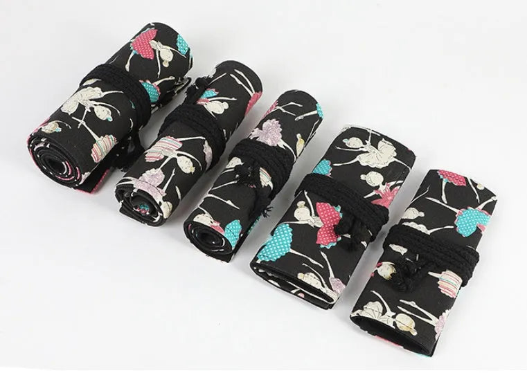 Canvas rolling pencil case with ballet girl print, showing multiple hole capacity options for colour pencils.