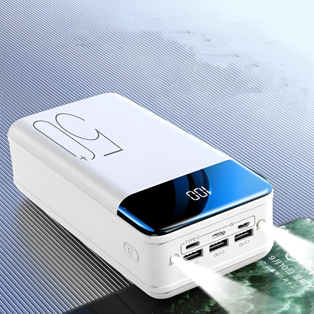 Black large capacity 50000mAh power bank with multiple USB ports on a white background