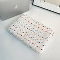 Polka dot patterned laptop bag for women, shown in available sizes for 11-inch to 15.6-inch laptops.