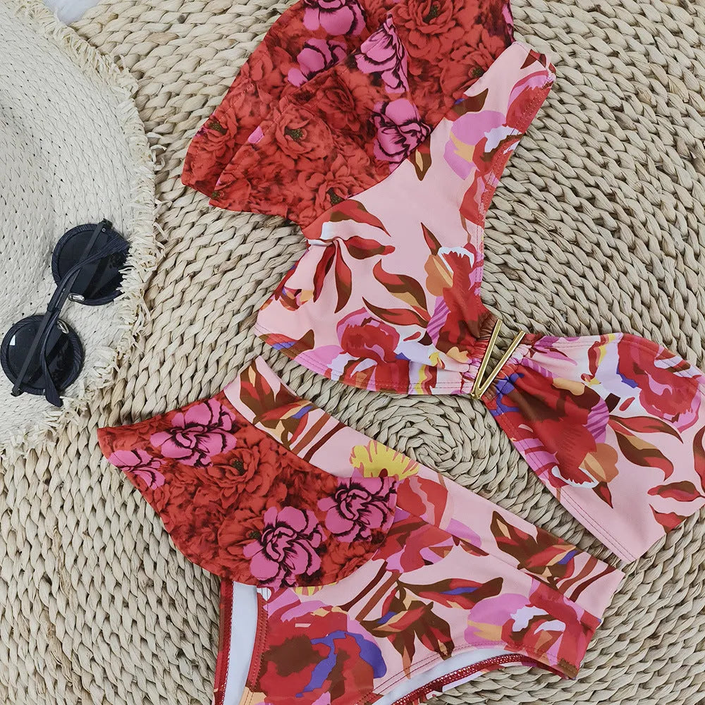 Pink and red floral print one-shoulder ruffled bikini with high-waist briefs.