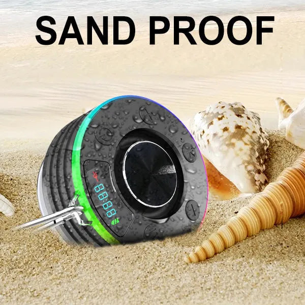 Waterproof Bluetooth speaker in black and sky blue with compact round design