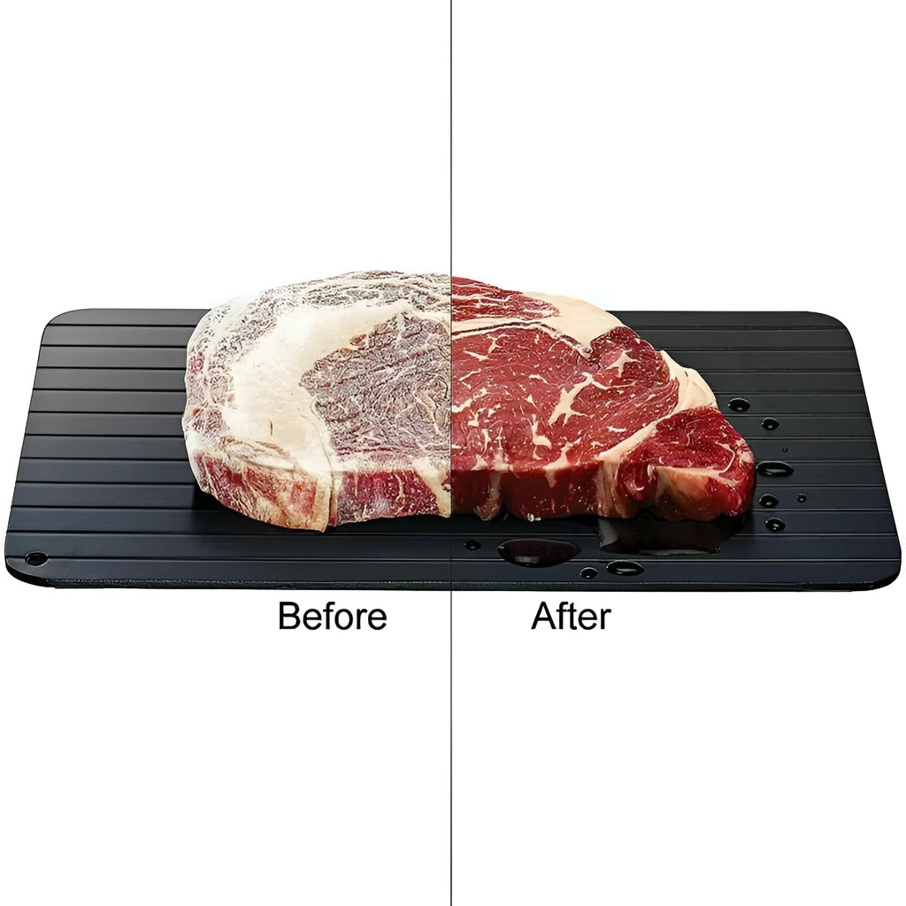 Black aluminium fast defrost tray for thawing frozen food on a kitchen counter.