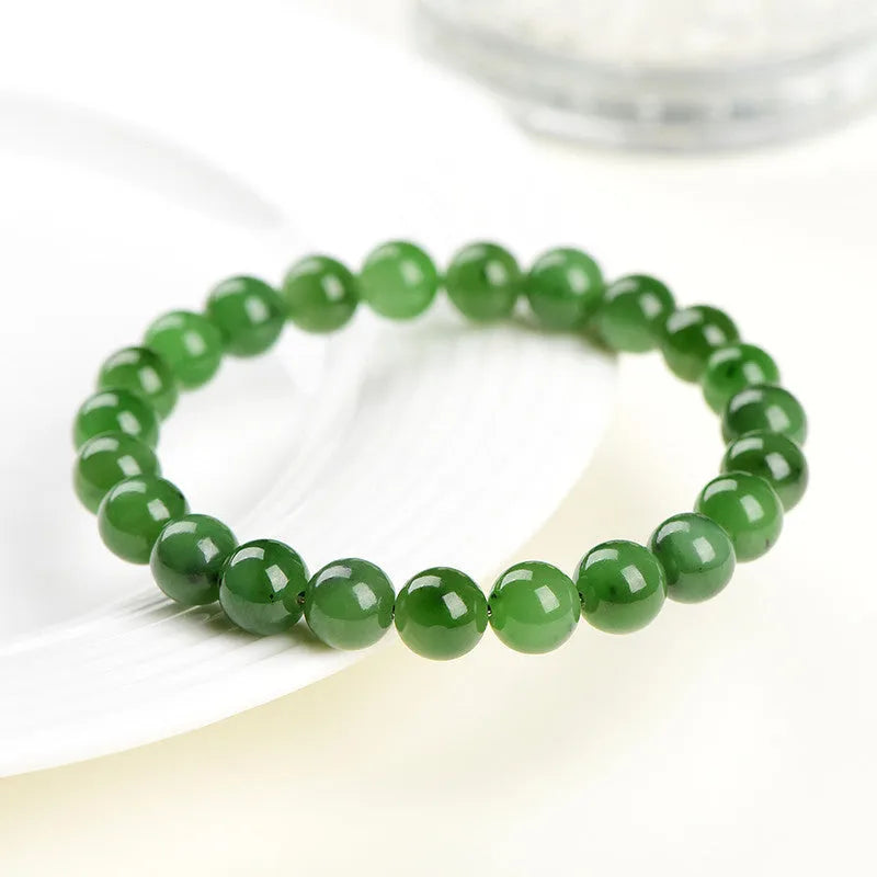 Natural Jasper ball bracelet on Hetian jade strand, showing polished beads in one of five available sizes.