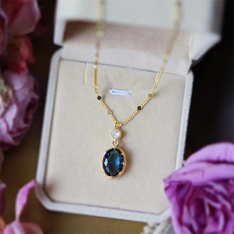 Gold geometric copper pendant necklace on a chain, retro French style.