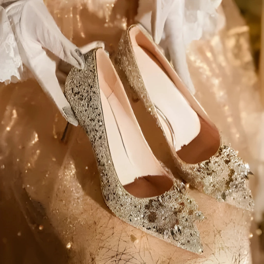 Champagne coloured pointed toe bridal shoes with rhinestone decoration and fine heel