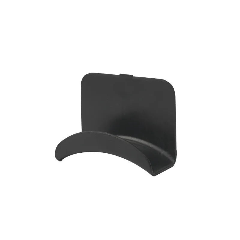 Black plastic headphone bracket mounted on wall with universal fit for headset storage