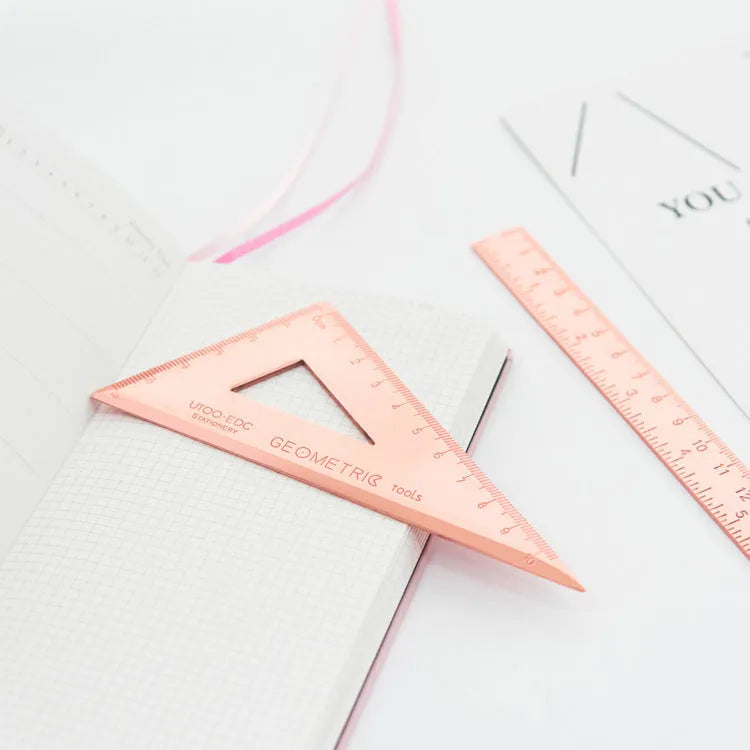 Stainless steel office ruler set with protractor, triangle plate, and 165mm ruler in rose gold finish, transparent sealing pocket