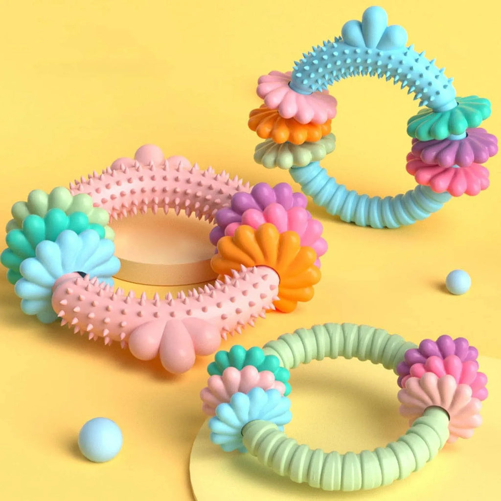 Blue TPR rubber chew ring dog toy for small dogs on a white background.