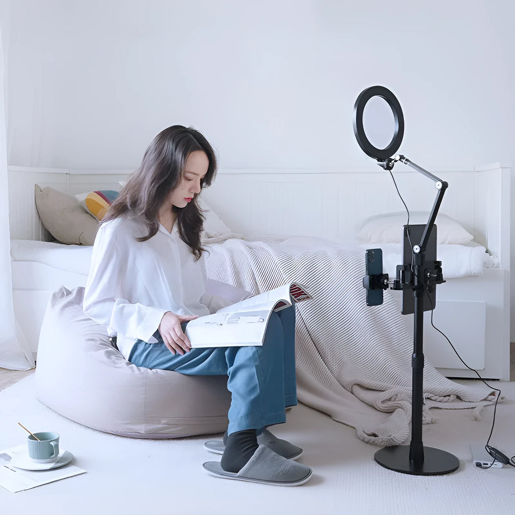 Black mobile phone tablet stand with fill light for live broadcast shooting showing folding rotation design
