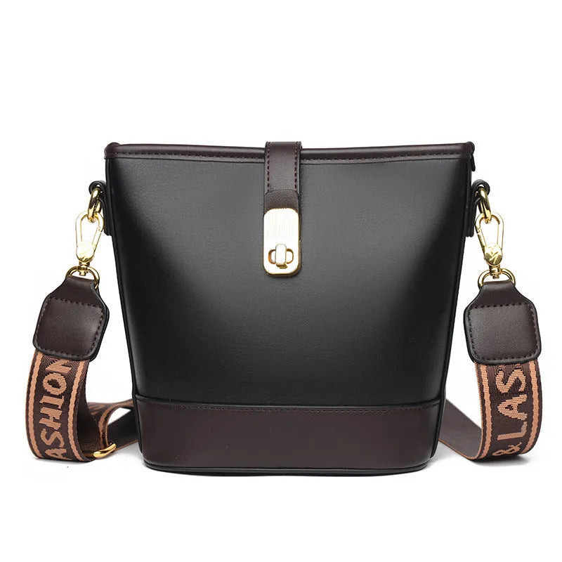 Korean-style black bucket messenger bag with double shoulder straps showing internal organiser compartments