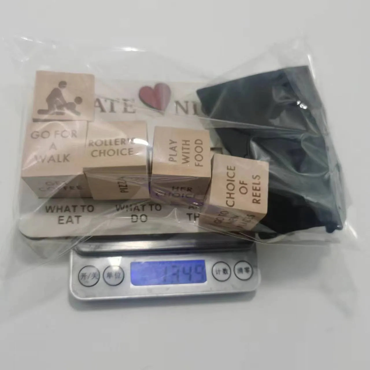 Wooden date night dice set with five decision dice, planner board, and black storage bag for couples