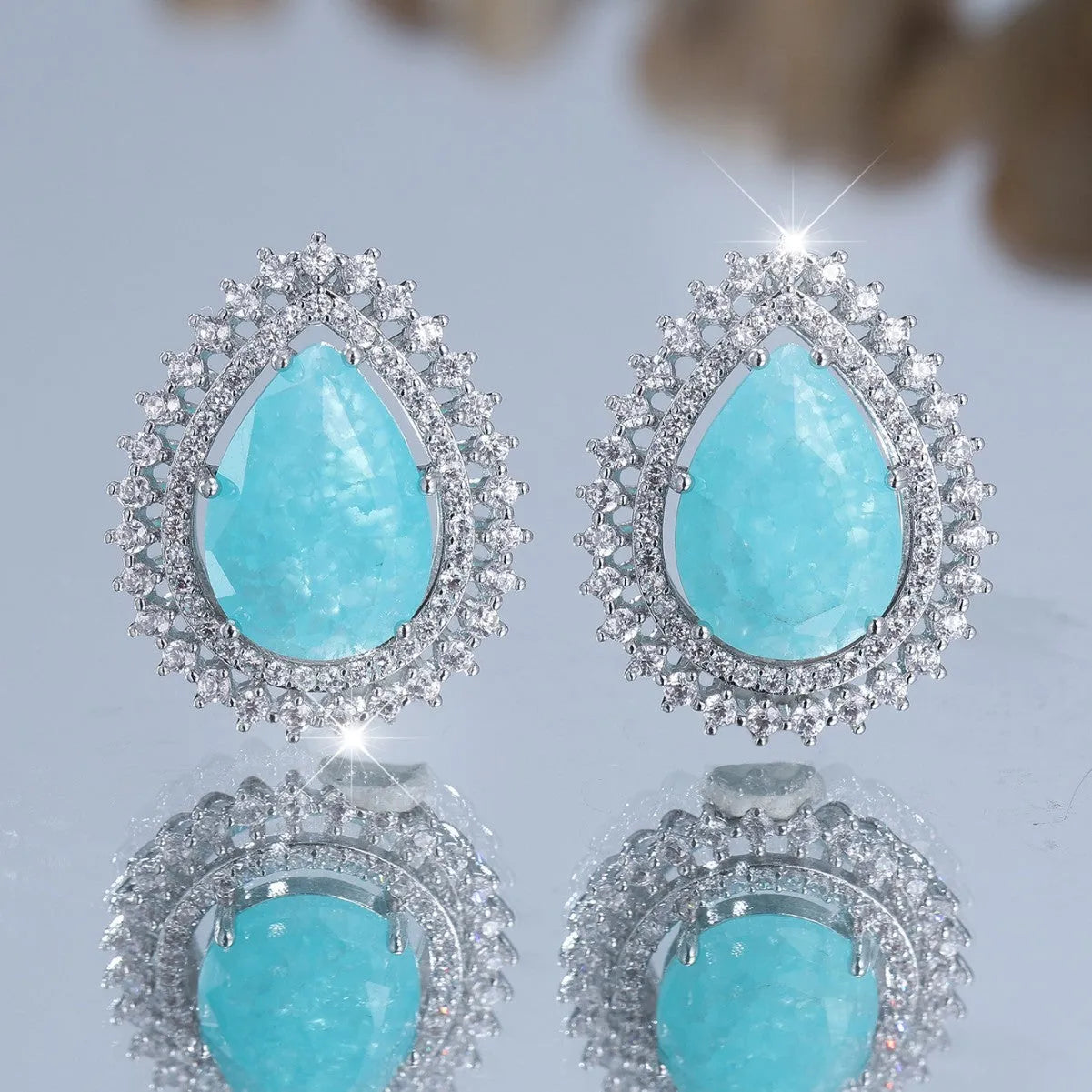 Women's platinum-coloured water drop earrings with heart-shaped ice flower diamond design elements