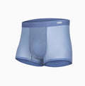 Man wearing seamless grey fitness shorts with antibacterial finish, sizes up to 3XL.