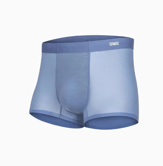 Man wearing seamless grey fitness shorts with antibacterial finish, sizes up to 3XL.
