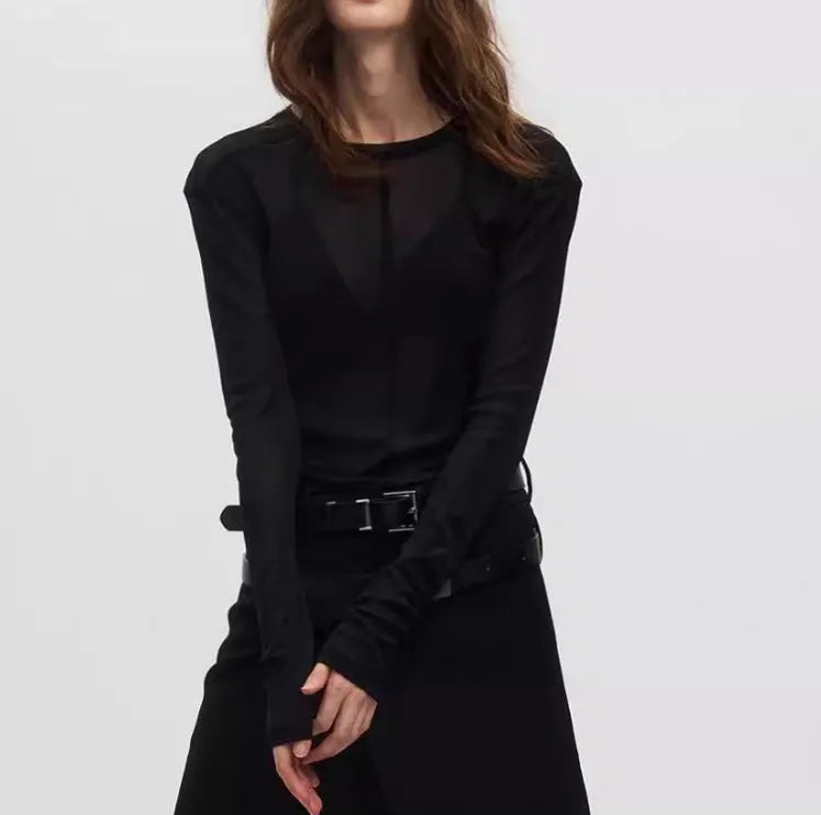 Black mesh see-through texture slim-fit long sleeve PU pullover on a hanger.