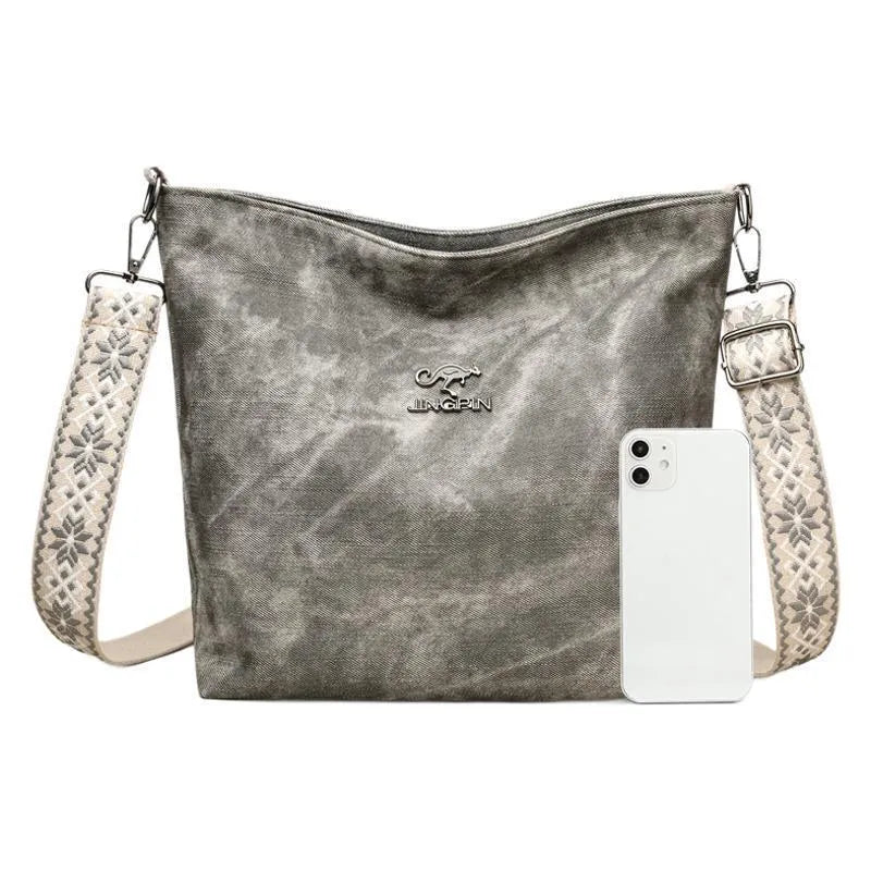 Soft PU leather crossbody shoulder bag in pink colour with large main compartment and single strap